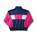 Bulk wholesale coach jacket back view with branded panel by Unida Sports