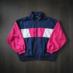 Wholesale coach jackets supplier front view by Unida Sports